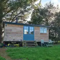 Woodland Serenity: The Shepherd's Hut Exterior 🌲